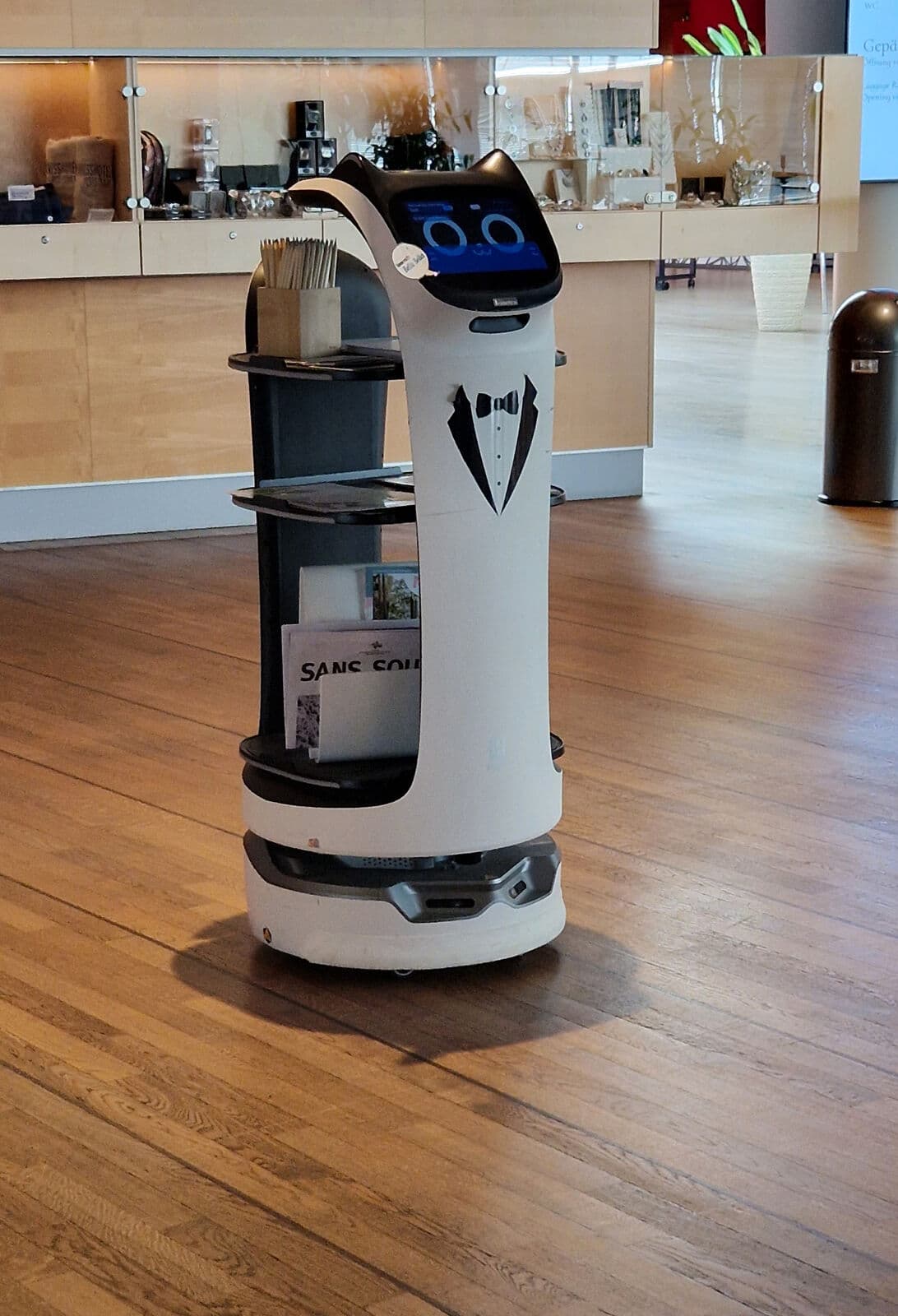 A Pudu BellaBot floor-service robot — the class of unit casino-resorts run for beverage and F&B routes