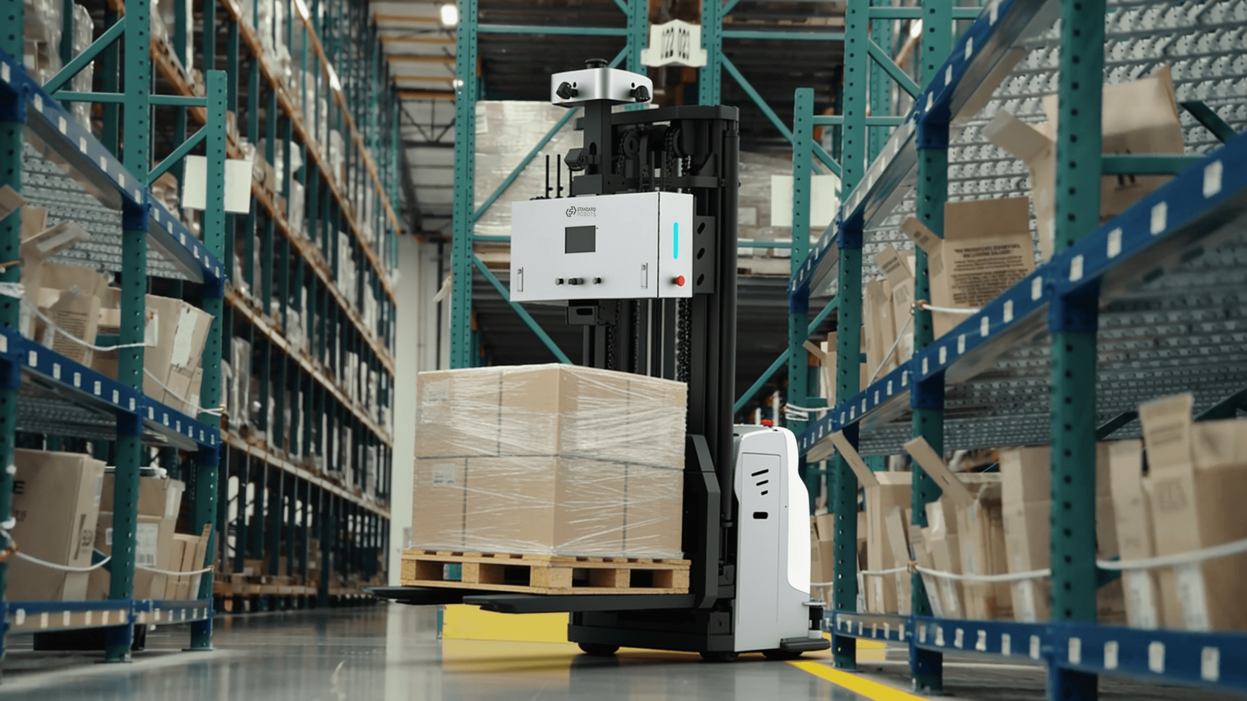 An autonomous forklift working a factory floor