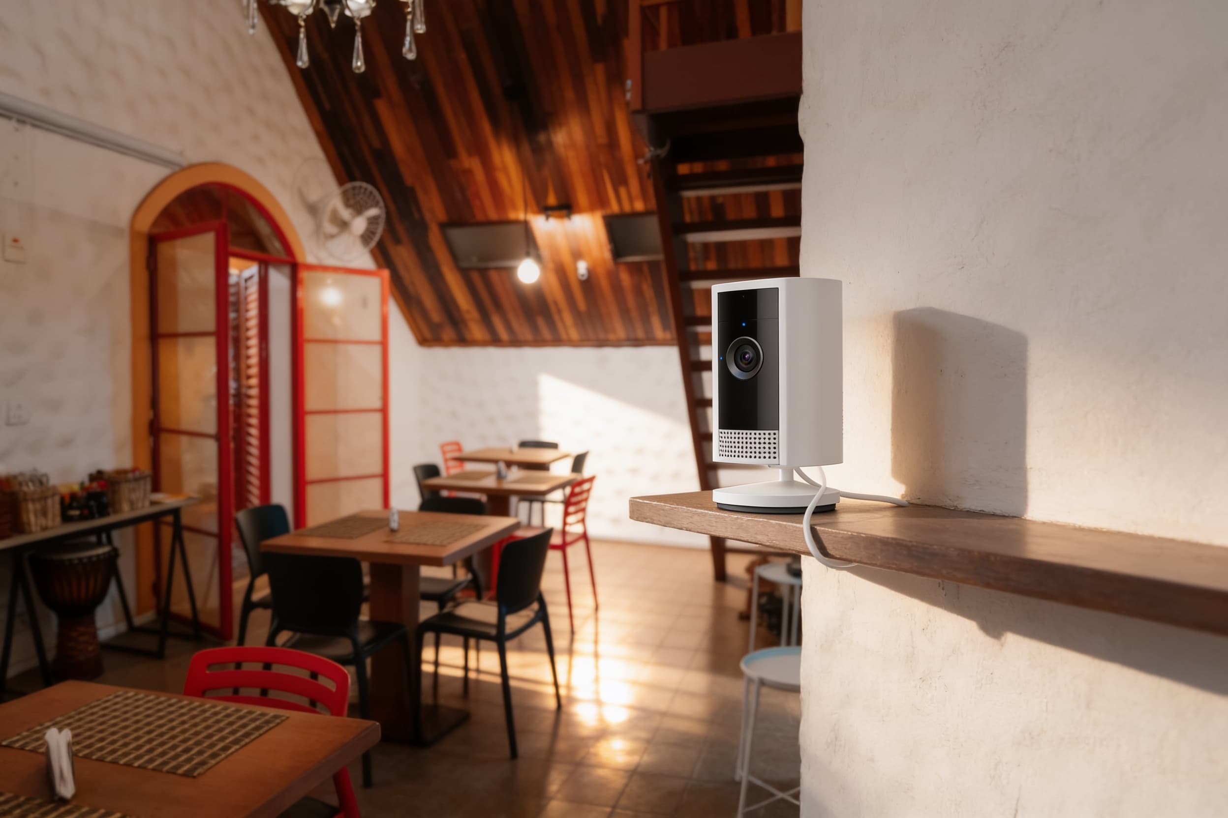 Compact camera overlooking a dining room