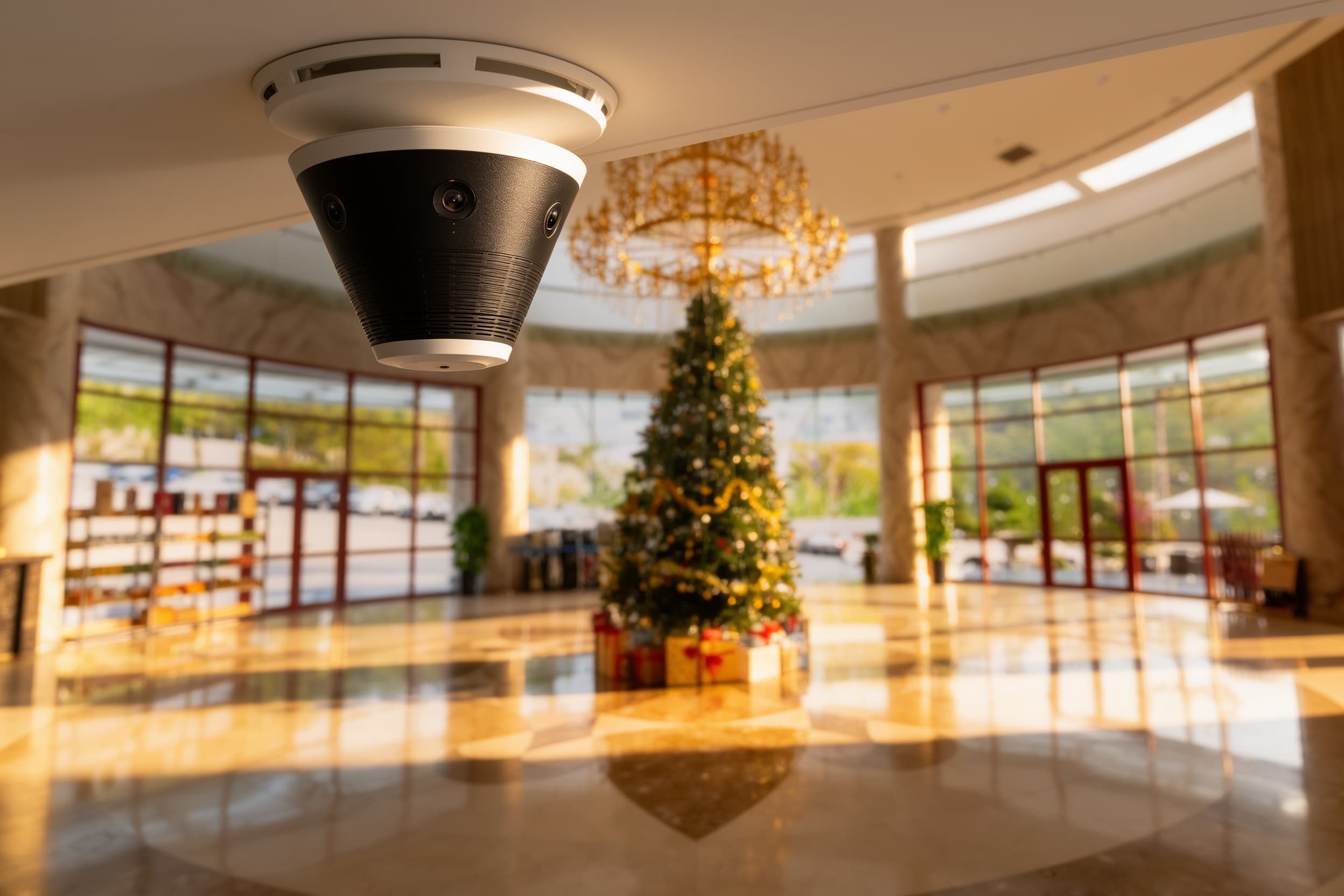 Ceiling camera overlooking a hotel lobby