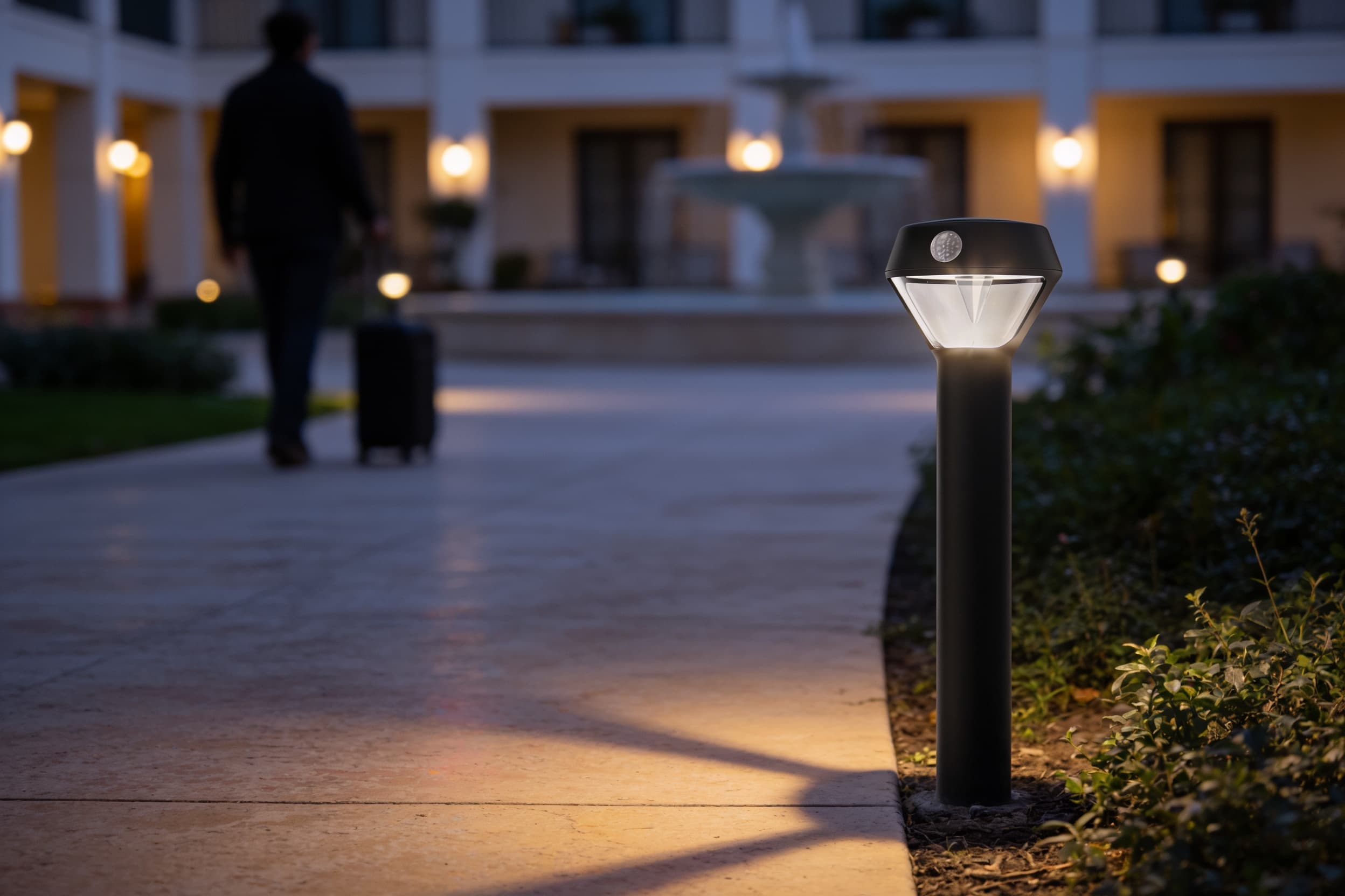 Solar pathlight along a hotel courtyard path